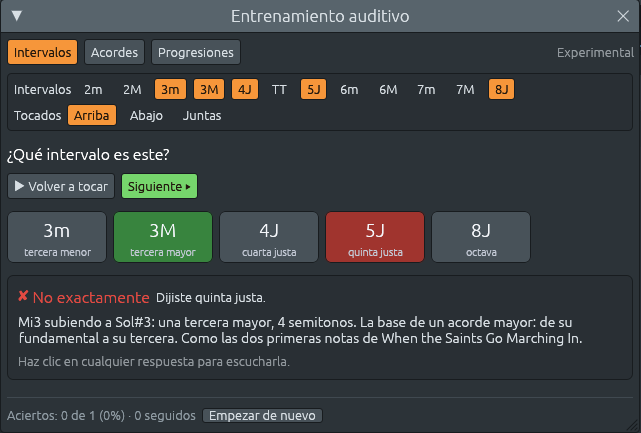 La ventana Entrenamiento auditivo en su pestaña Intervalos: los intervalos 3m, 3M, 4J, 5J y 8J elegidos, tocados Arriba. La respuesta 5J está en rojo y 3M en verde, y el recuadro dice «No exactamente. Dijiste quinta justa. Mi3 subiendo a Sol#3: una tercera mayor, 4 semitonos. La base de un acorde mayor: de su fundamental a su tercera. Como las dos primeras notas de When the Saints Go Marching In.» La línea de puntos dice «Aciertos: 0 de 1 (0%) · 0 seguidos».